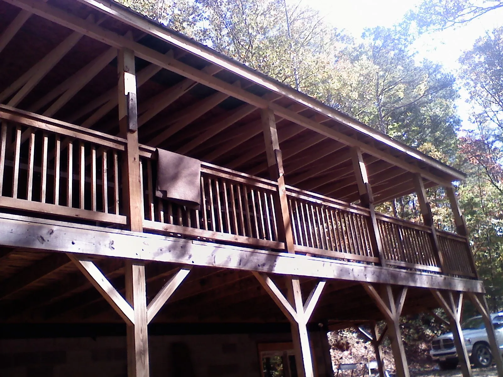 Timber framing under a new elevated porch and deck — Roof Leak Repair in Essex by Roofing Brothers